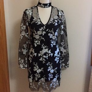 Gorgeous lace overlay on sewn in black liner